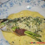 Roast trout served in a white wine butter sauce