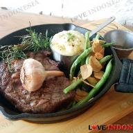 Grilled Herb Steak with Cheese Gratin