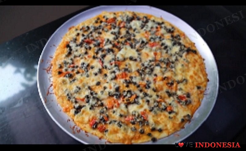 Intip Yuk, Serunya Masak Pizza Tutut yang Lezat ala Susi Pudjiastuti